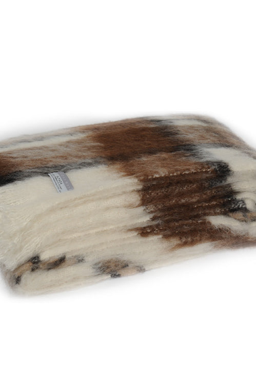 Folded Alpaca fleece throw in Apache colour.