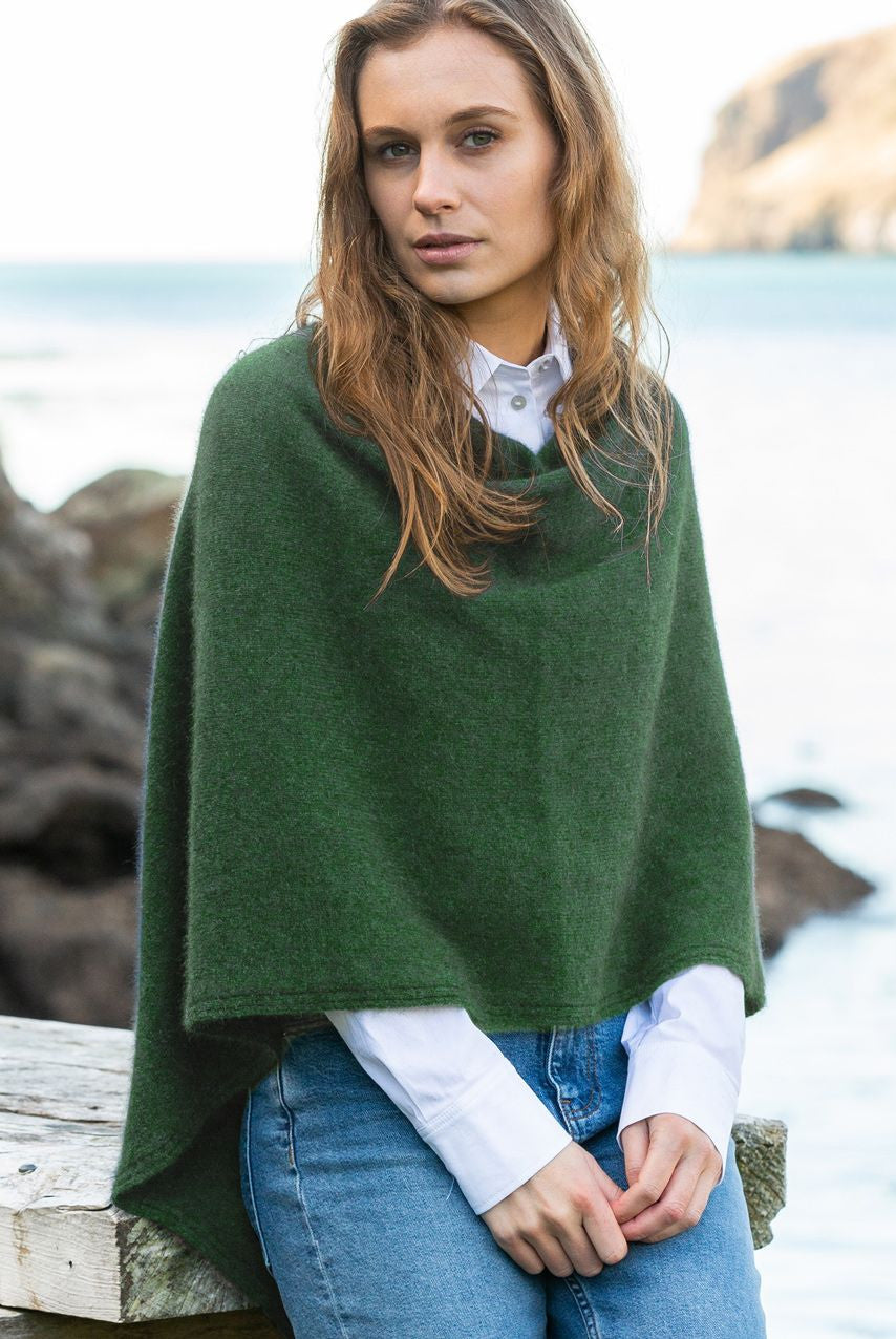 Woman wearing Noble Wilde - Merino & Possum North Cape (NW3086) in the colour Jungle.