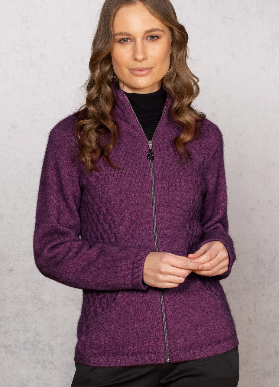 Woman wearing Noble Wilde - Merino & Possum Honeycomb Jacket (NW3149) in the colour Paua.