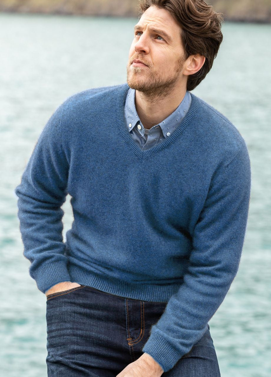 Man wearing the Noble Wilde - Merino & Possum Oxford Vee Sweater (NW1002) in the colour Bahama.