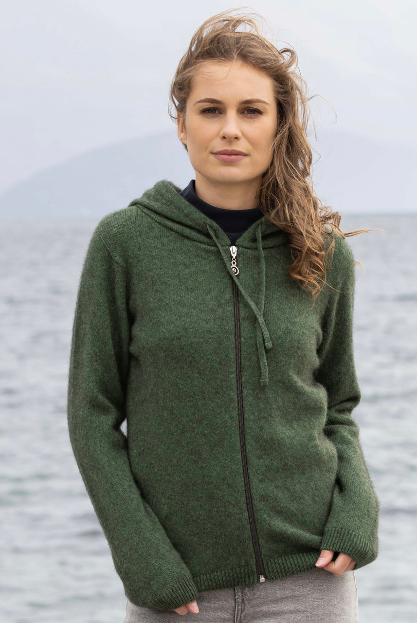 Woman wearing Noble Wilde - Merino and Possum Oulu Hoodie (NW3231) in the colour Jungle.