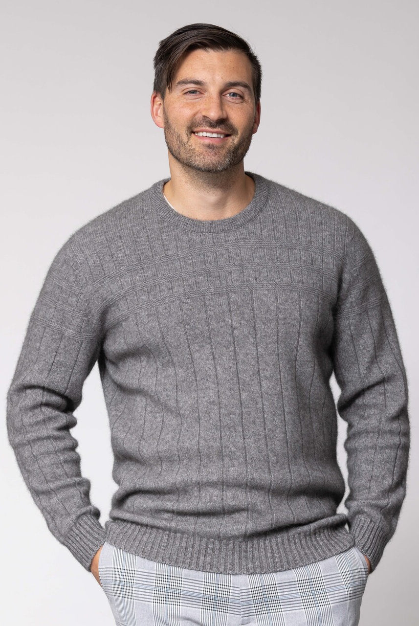Man wearing Noble Wilde - Merino & Possum Riverton Sweater (NW1101) in the colour Shale.