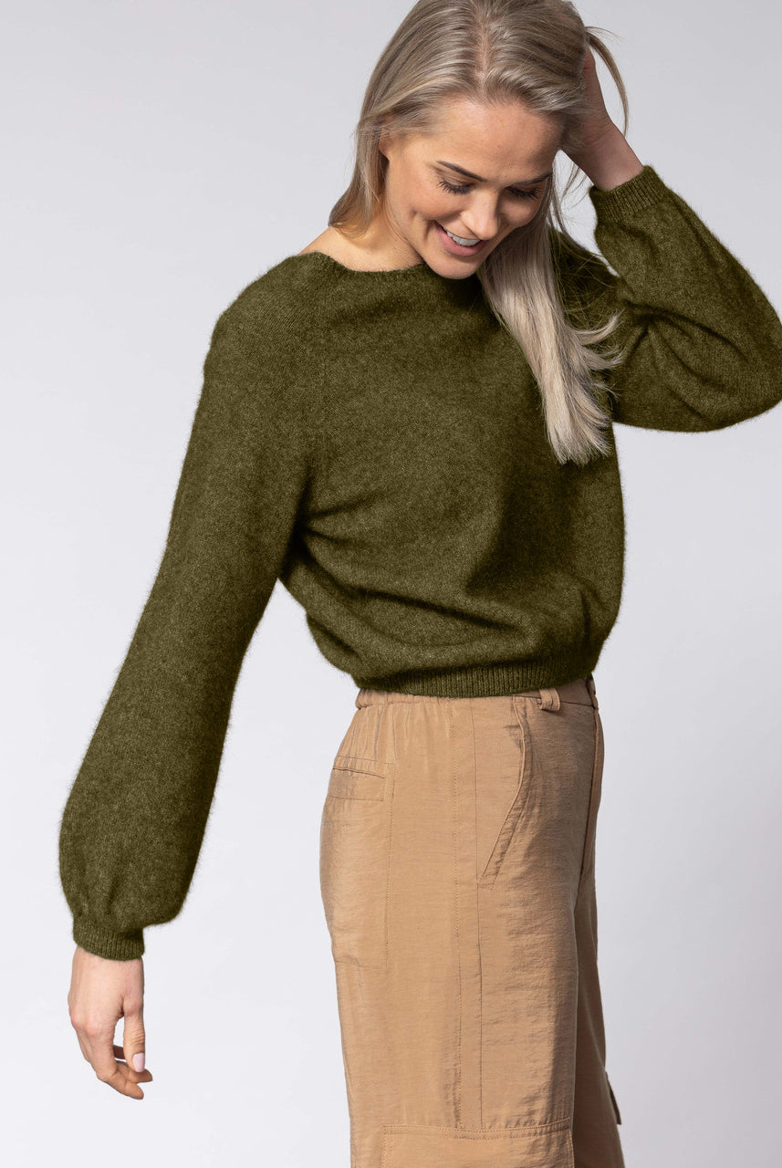 Woman wearing Noble Wilde - Merino & Possum Bellow Sleeve Top in the colour Avoka.