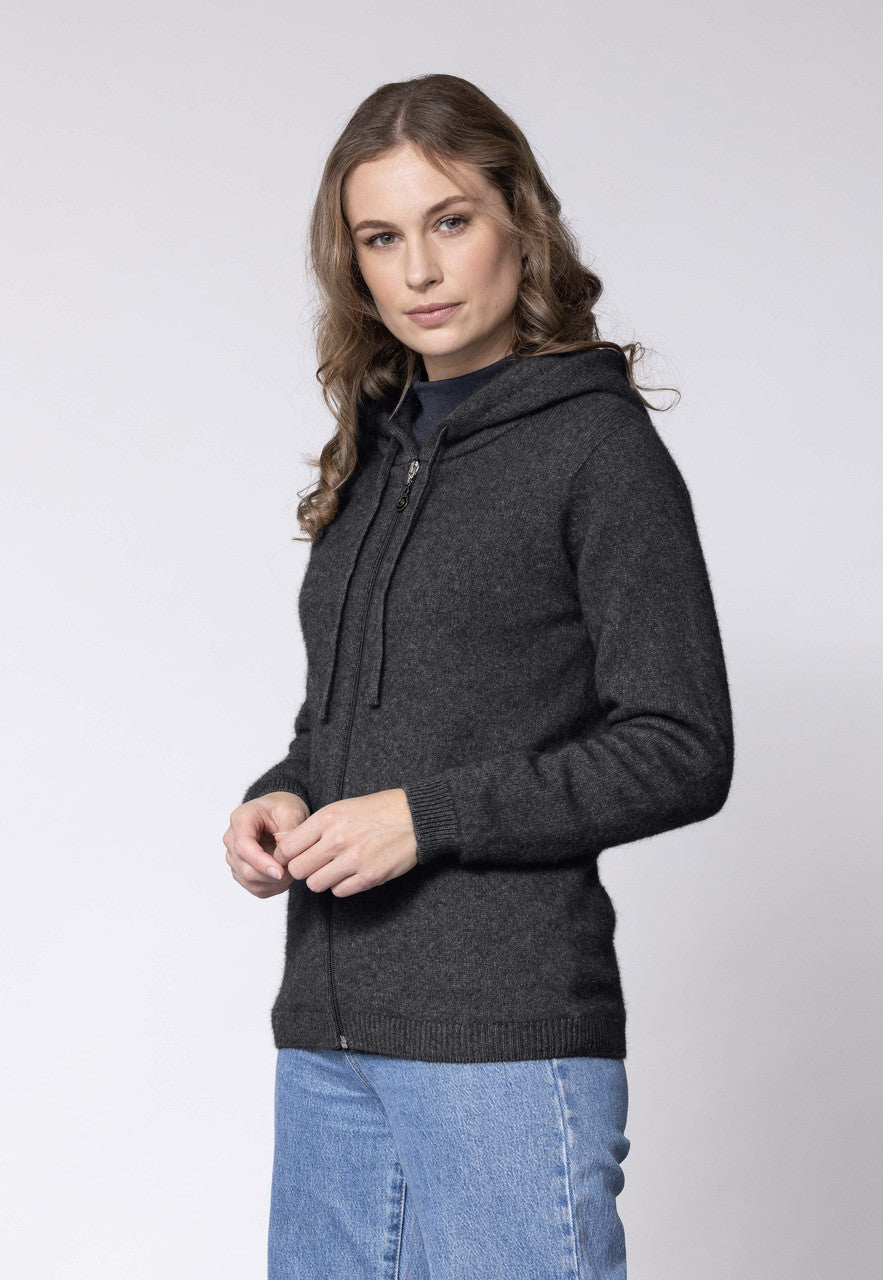 Woman wearing Noble Wilde - Merino and Possum Oulu Hoodie (NW3231) in the colour Charcoal.