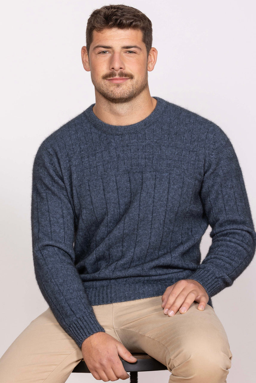 Man wearing Noble Wilde - Merino & Possum Riverton Sweater (NW1101) in the colour Neptune.