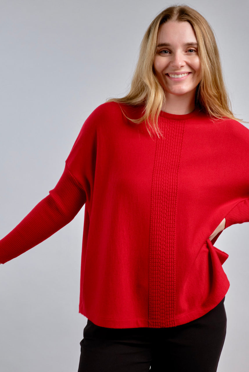 Woman wearing Country Laine - Merino Swing Jumper (CL0075) in the colour Blood Red.