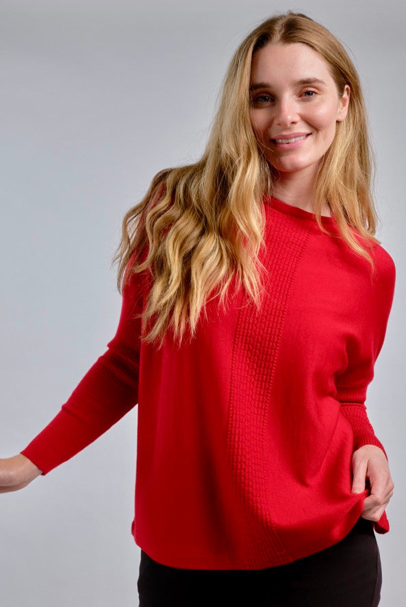 Woman wearing Country Laine - Merino Swing Jumper (CL0075) in the colour Blood Red.
