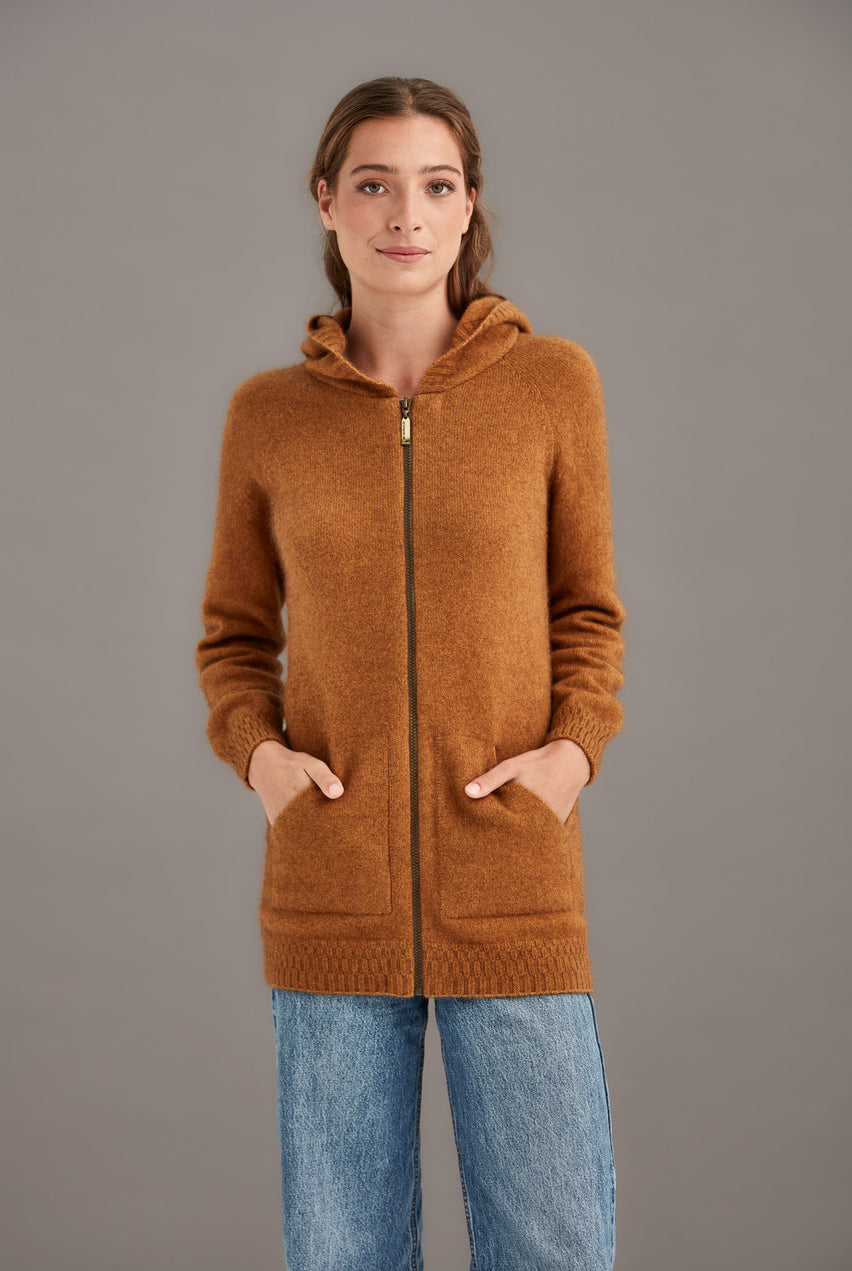 Woman wearing McDonald - Merino & Possum Stepped Stitch Hoodie (5063) in the colour Honeycomb.