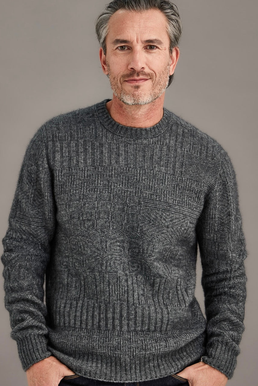 Man wearing McDonald - Merino & Possum Patchwork Sweater (6641) in the colour Pewter