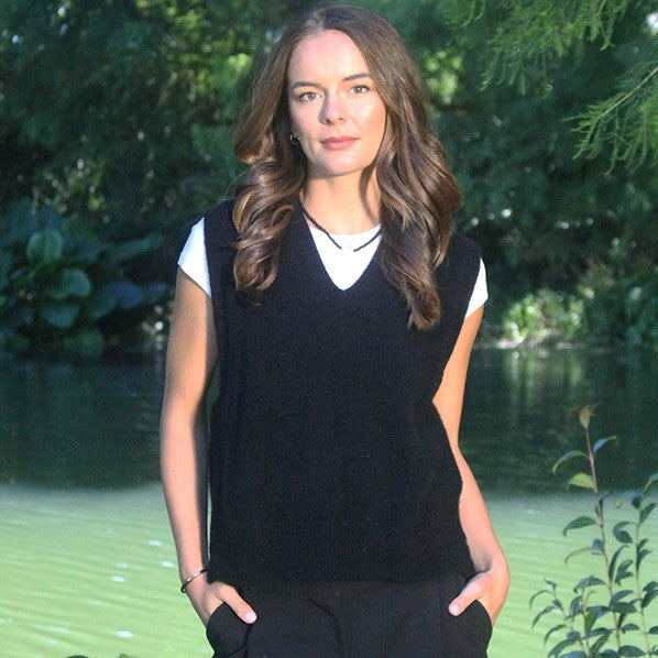 Woman wearing the Lothlorian - Merino & Possum Ride Vest (9650) in the colour Black.