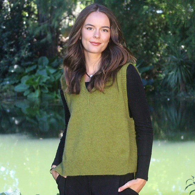 Woman wearing the Lothlorian - Merino & Possum Ride Vest (9650) in the colour Olive.