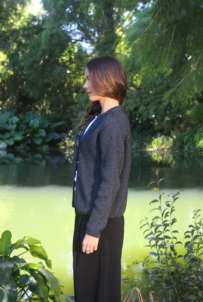 Woman wearing the Lothlorian - Merino & Possum Fuse Tie Jacket (9972) in the colour Charcoal.