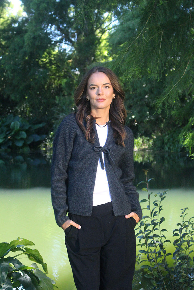 Woman wearing the Lothlorian - Merino & Possum Fuse Tie Jacket (9972) in the colour Charcoal.
