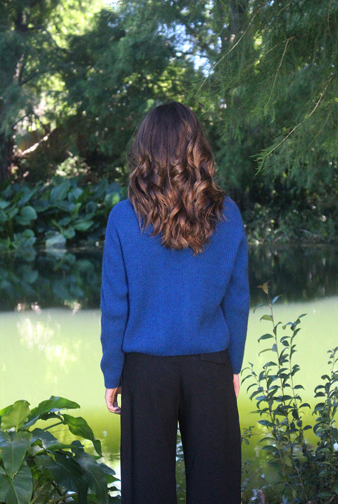 Woman wearing the Lothlorian - Merino & Possum Fuse Tie Jacket (9972) in the colour Lagoon.
