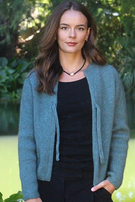 Woman wearing the Lothlorian - Merino & Possum Fuse Tie Jacket (9972) in the colour Sage.