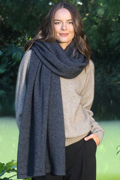 Woman wearing Lothlorian - Merino & Possum Brando Wrap (9993) in the colour Charcoal.