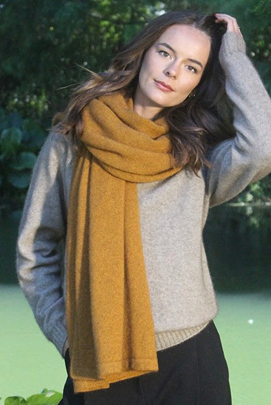 Woman wearing Lothlorian - Merino & Possum Brando Wrap (9993) in the colour Gold.