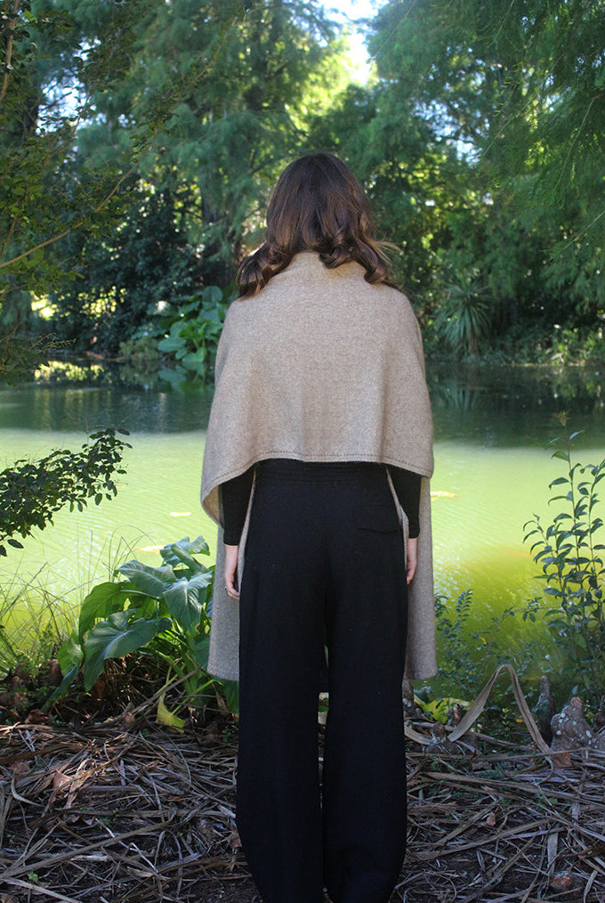 Woman wearing Lothlorian - Merino & Possum Brando Wrap (9993) in the colour Natural.