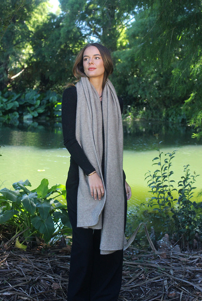 Woman wearing Lothlorian - Merino & Possum Brando Wrap (9993) in the colour Natural.