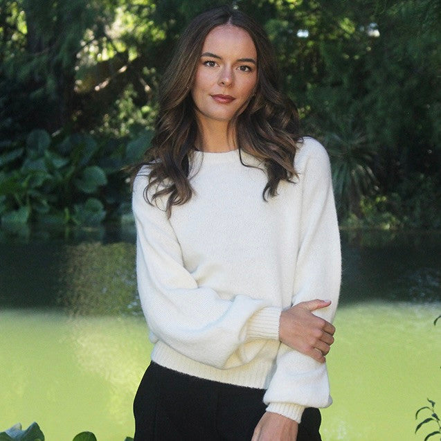Woman wearing the Lothlorian - Alpaca Chime Jumper (ALP079) in the colour Natural.