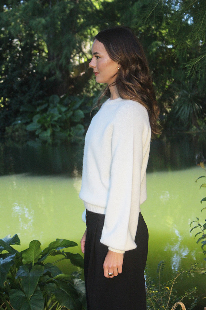 Woman wearing the Lothlorian - Alpaca Chime Jumper (ALP079) in the colour Natural.