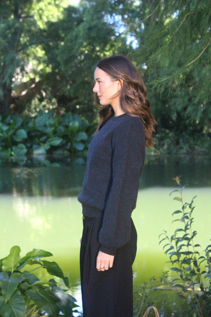 Woman wearing the Lothlorian - Alpaca Chime Jumper (ALP079) in the colour Slate.
