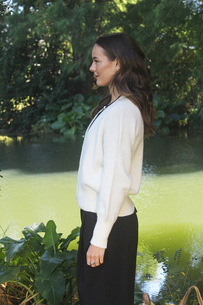 Woman wearing Lothlorian - Alpaca Enclave Cardigan (ALP080) in the colour Natural.