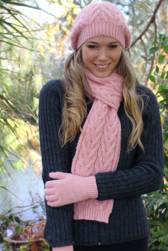 Female wearing beanie, scarf and gloves. Colour Rose