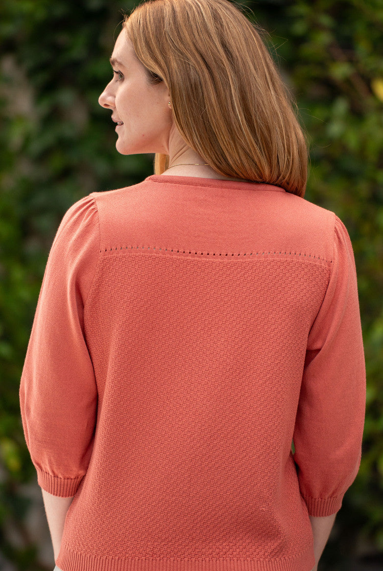 Woman wearing Country Laine - Cotton Eyelet Yoke Jumper (CL0094) in the colour Sienna.