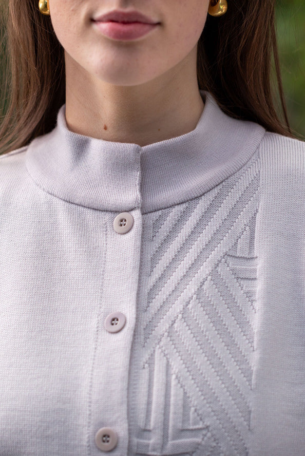 Woman wearing Country Laine - Diagonal Cardi (CL0126-IND2026) in the colour Cement.