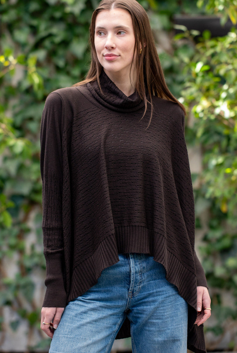 Woman wearing Country Laine - The Nest Top (CL0130-IND2026) in the colour Chocolate.
