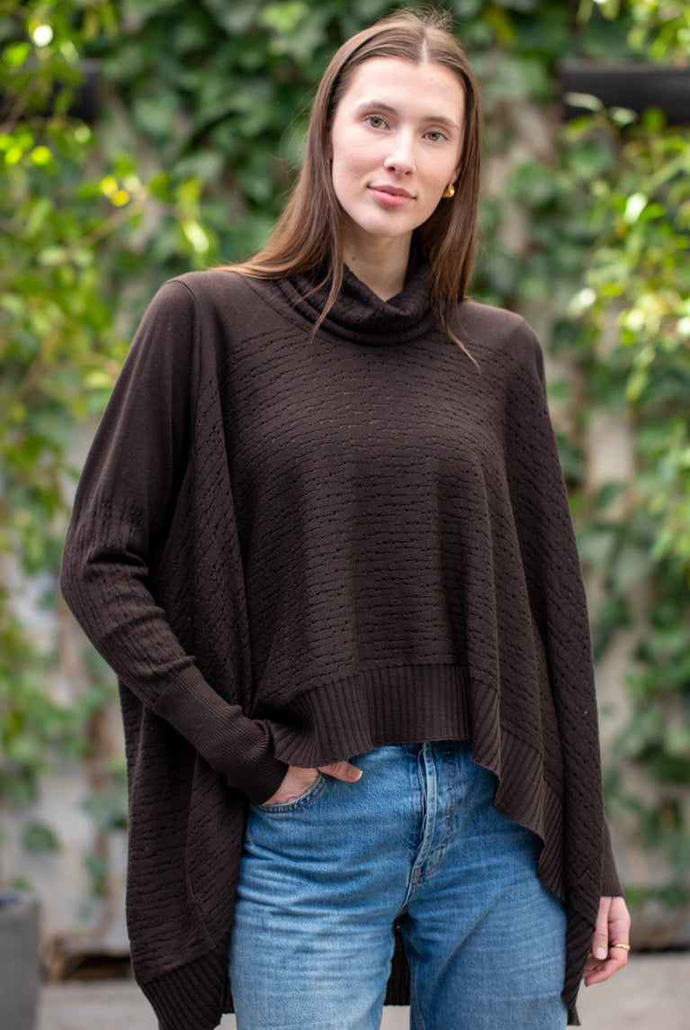 Woman wearing Country Laine - The Nest Top (CL0130-IND2026) in the colour Chocolate.