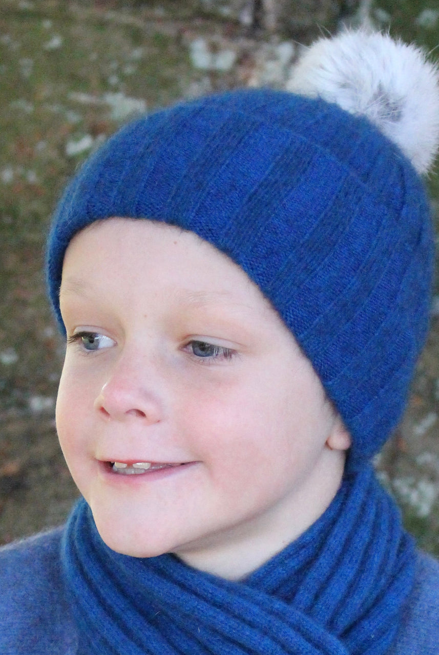 Child wearing beanie. Colour Lagoon