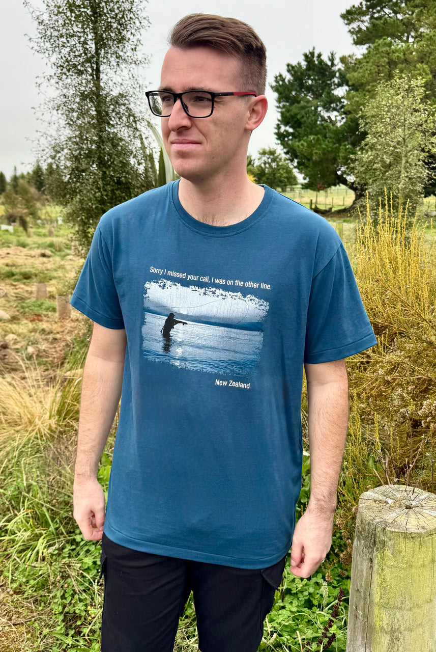 Man wearing tee in colour blue.