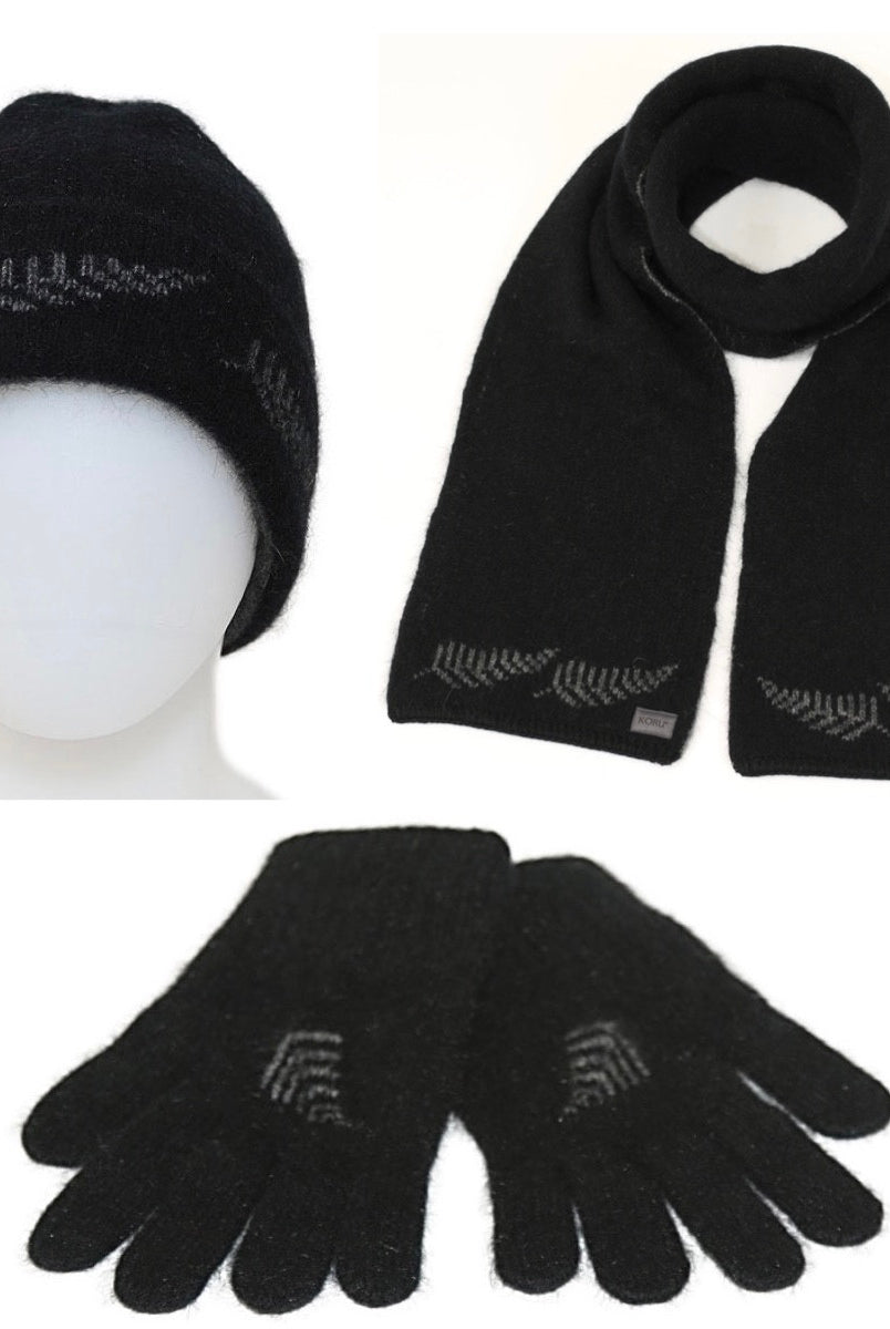 A Koru Silver Fern Accessory Set of scarf, gloves, and beanie in black.