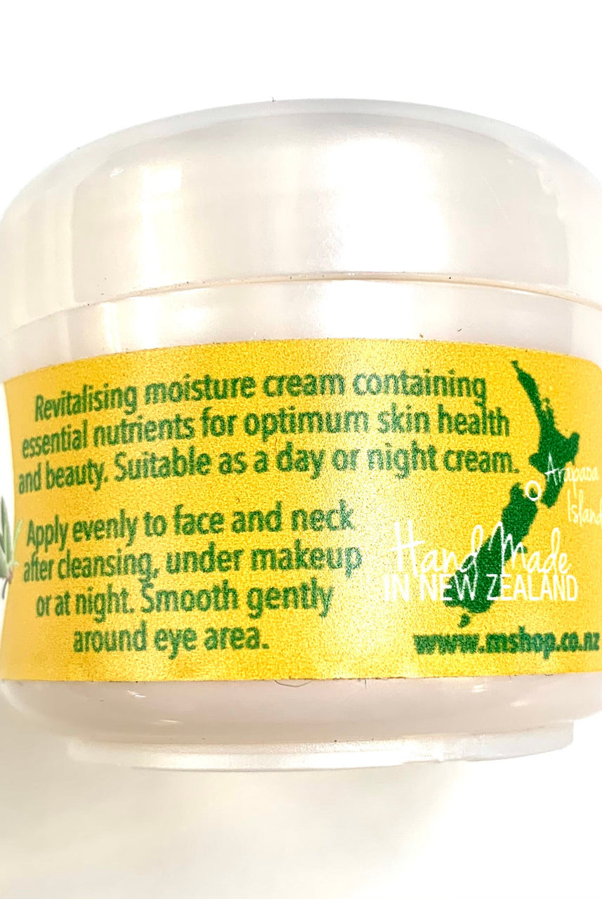 Side view of 50ml pot of face cream. Yellow label with instructions.