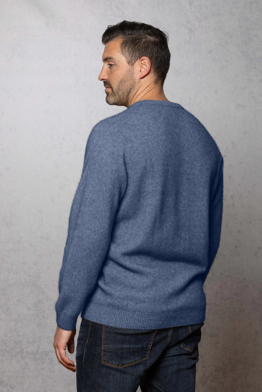 Man wearing the Noble Wilde - Merino & Possum Cambridge Crew Sweater (NW1001) in the colour Bahama.