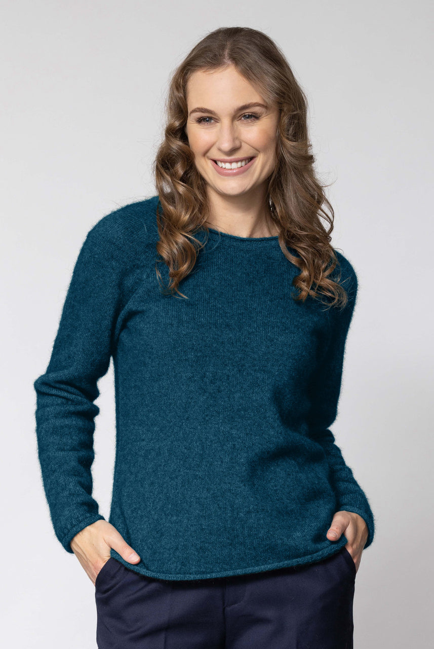 Woman wearing Noble Wilde - Merino and Possum Rutland Raglan Crew (NW3228) in the colour Tui.