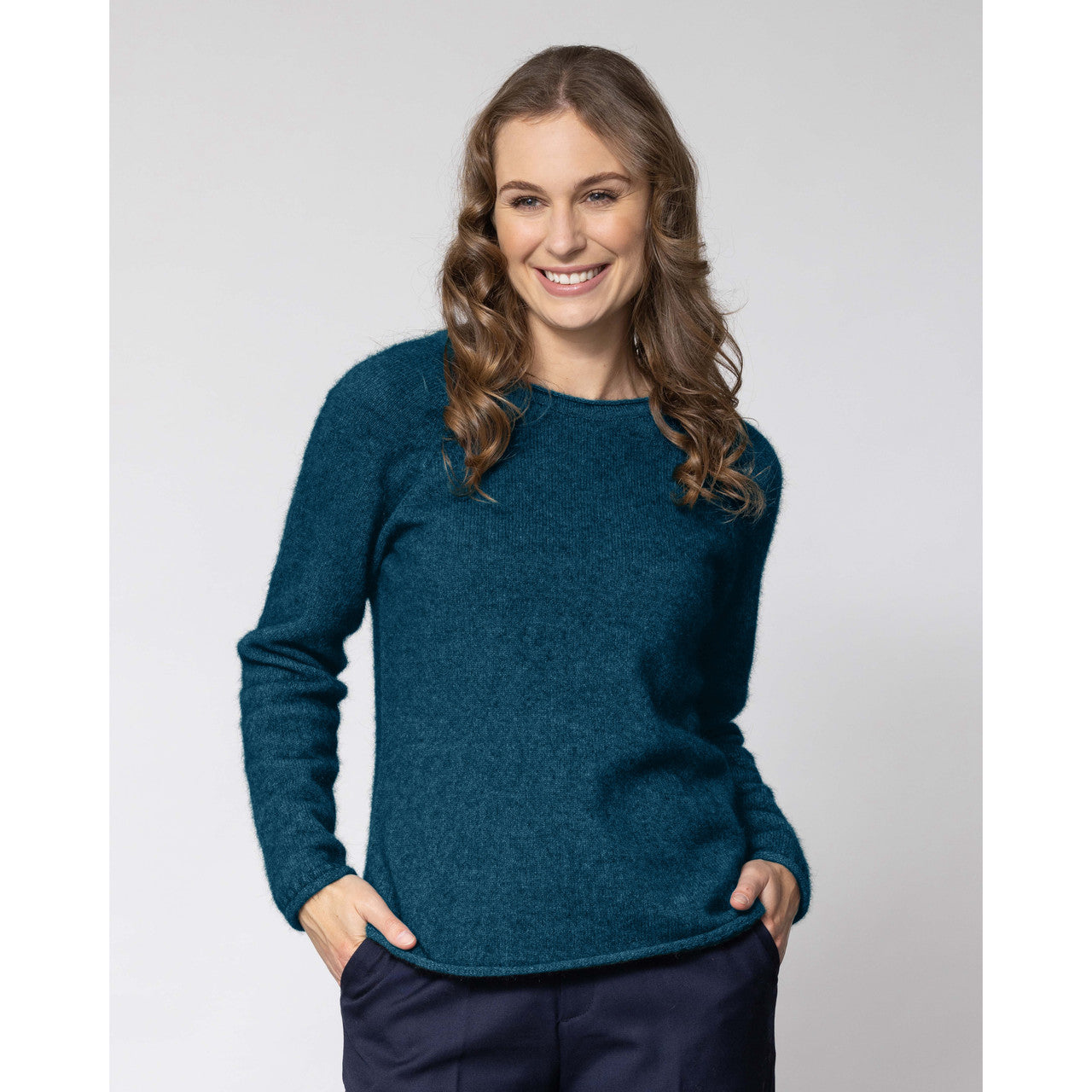 Woman wearing Noble Wilde - Merino and Possum Rutland Raglan Crew (NW3228) in the colour Tui.