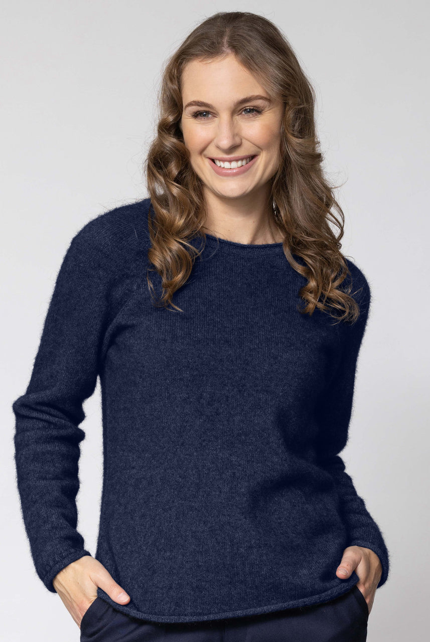 Woman wearing Noble Wilde - Merino and Possum Rutland Raglan Crew (NW3228) in the colour Maritime.