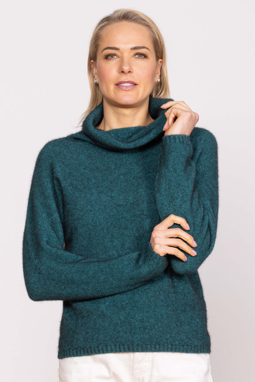 Woman wearing Noble Wilde - Merino & Possum Moss Switch Cowl Jumper (NW3126) in the colour Paua.