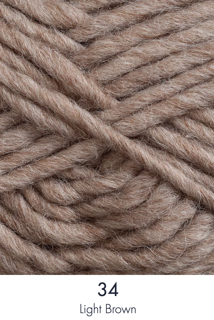 Close up ball of yarn in colour light brown.