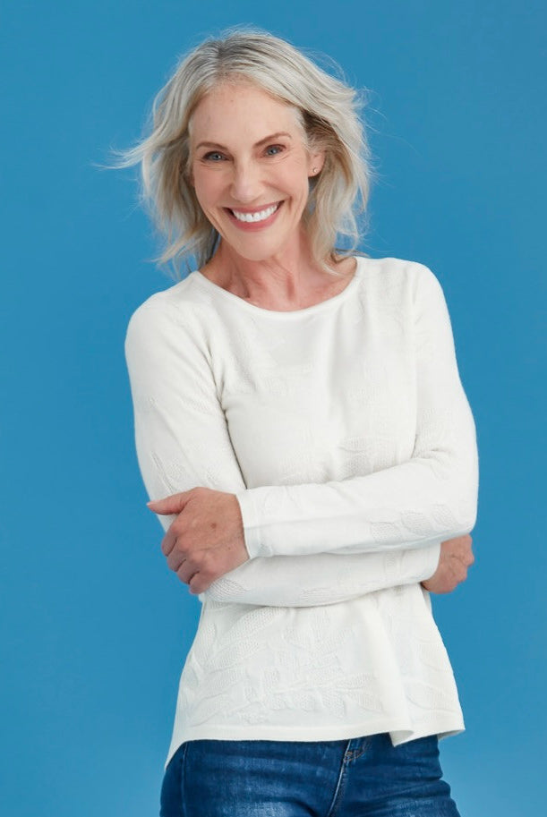 Woman wearing Royal Merino - Flora Stitch Sweater (RM3033) in the colour Natural