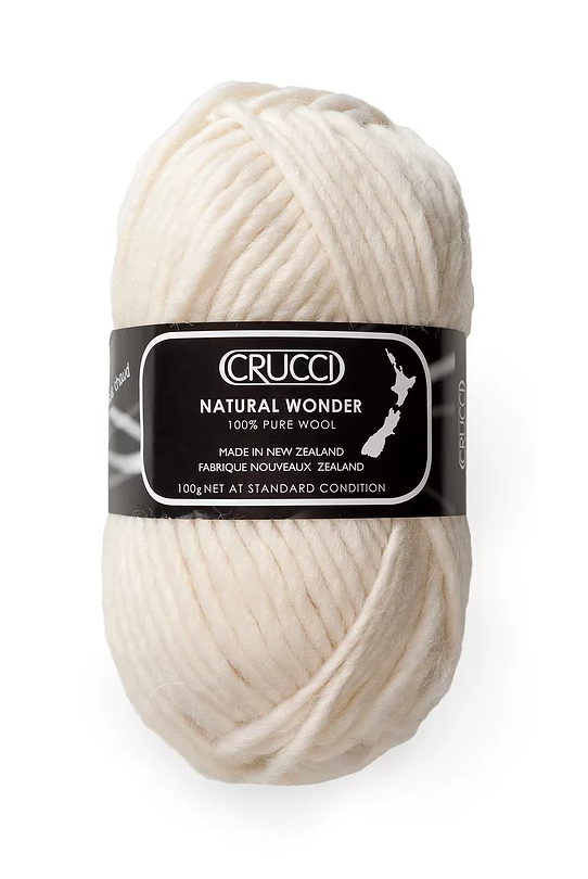 Cream colour ball of yarn.