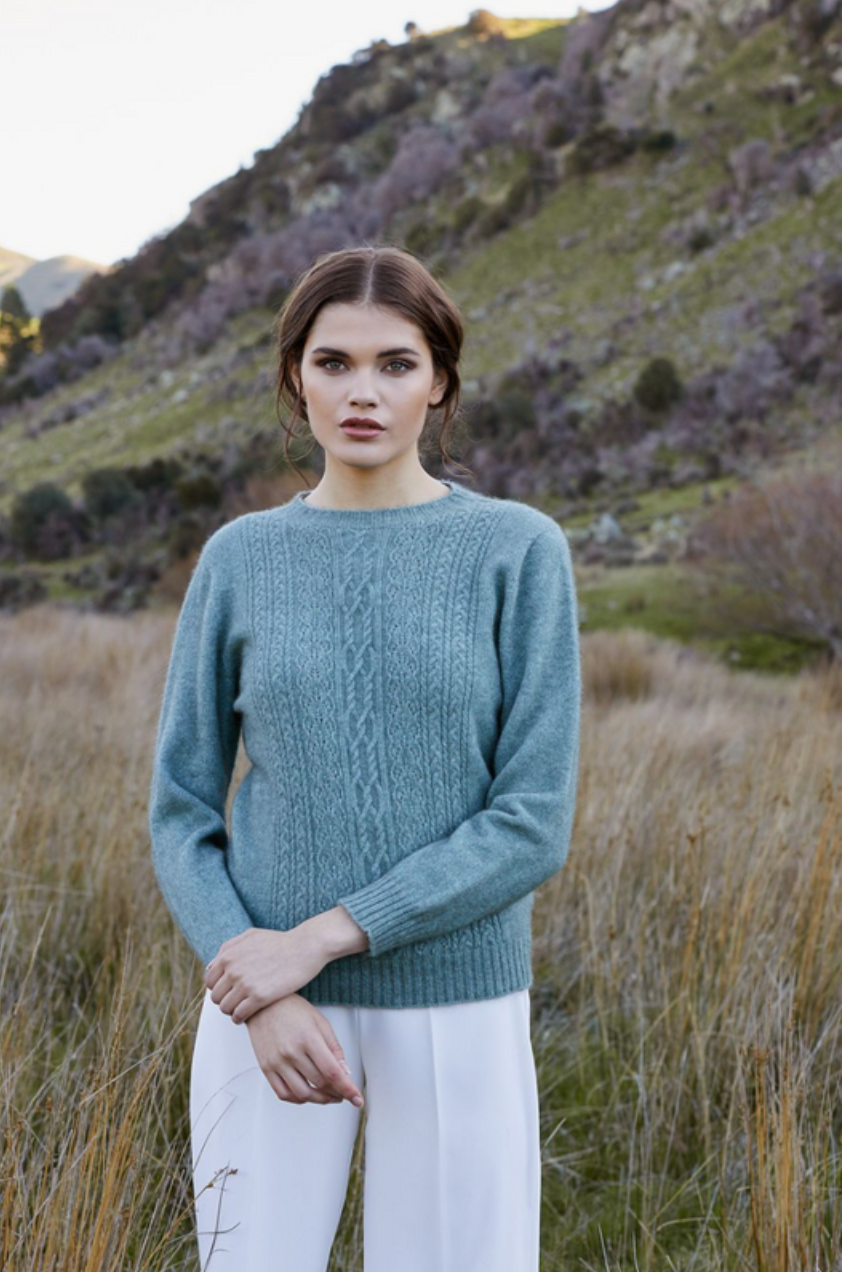 Possum and merino crew neck jersey with lace detail. Mint