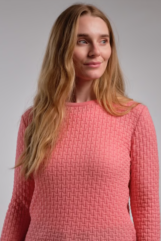 Woman wearing Country Laine - Merino Basketweave Jumper (CL0057) in the colour Peach.
