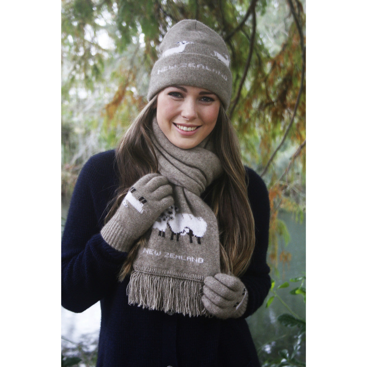 Woman wearing scarf with sheep detailing