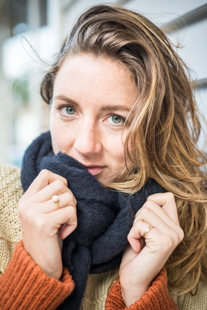 Woman wearing scarf in colour Grey/Black Marl