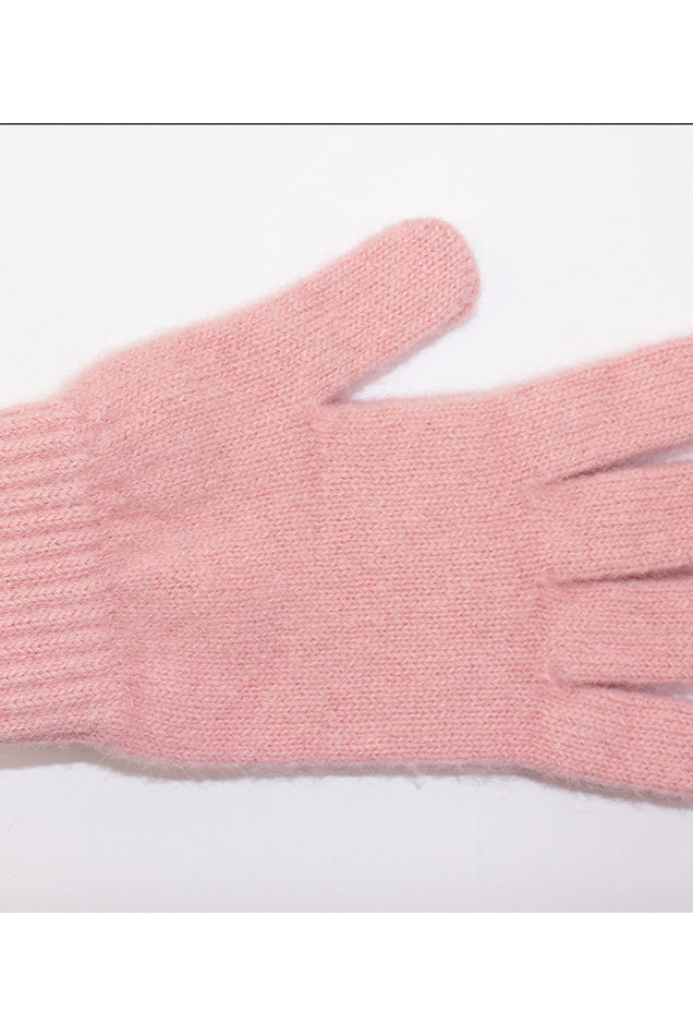 Rose colour Alpaca glove. White background.