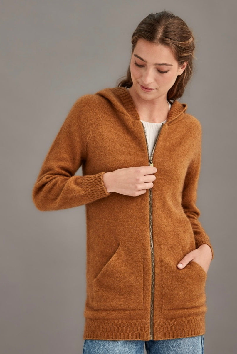 Woman wearing McDonald - Merino & Possum Stepped Stitch Hoodie (5063) in the colour Honeycomb.